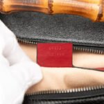 Gucci  Small GG Marmont Matelasse Diagonal Leather Torchon Bamboo Satchel - Image 2